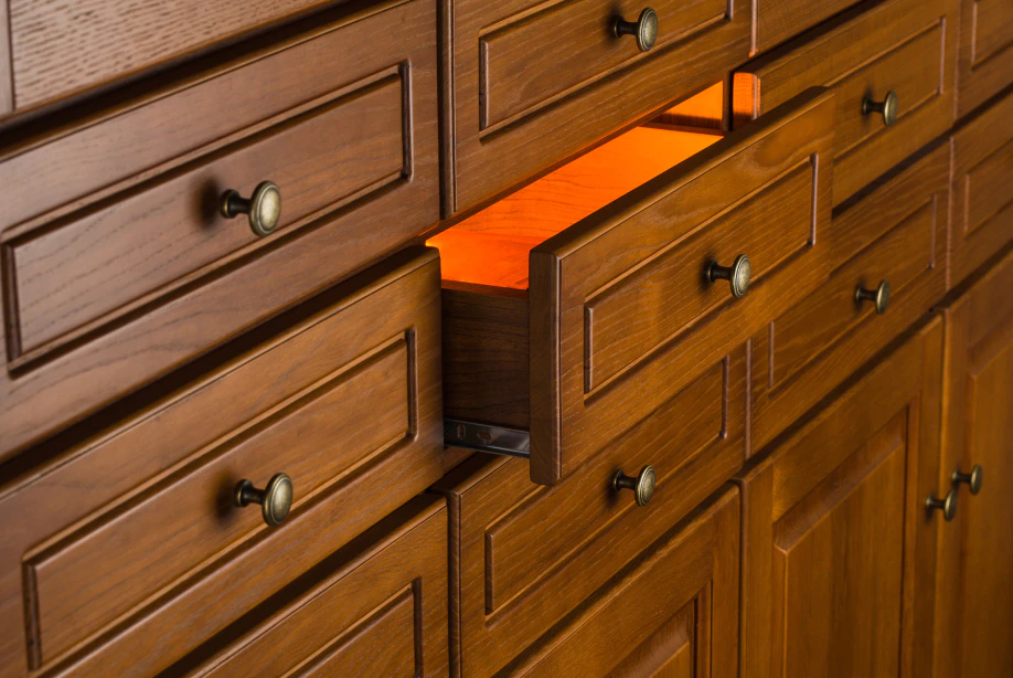 orange light from drawer concept of secret storage of valuable objects sarasota fl 1